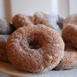 15 Minutes Homemade Donuts Homemade Donuts taste like what you get at a local bakery, but you can make them at home in 15 minutes! This simple donut recipe is perfect for a quick weekend treat and always guarantees to satisfy those cravings for delicious teeth.                                        Home-Made Donuts In Simple Cake Style The bite-sized donuts (AKA Donut Holes) are glossy and golden brown, the outside is coated with sugar, and the inside is soft and smooth, soft. Like a donut of an old but ready-made cake in an instant!    I made this simple donut recipe because who can resist a new donut? But how many of us want to put in the whole effort of donating homemade donations? I've seen donut holes made with store-bought biscuit dough but I'm talking about the freshly made dough. It's a hundred times better and incredibly easy. No mixer required, no mixing, rolling, or cutting. Just a quick shake and shape and ready to fry!   Top ideas This simple homemade donut dough is made with flour, milk, egg yolks, yeast, and sugar, then the donuts are fried and topped with sugar. This recipe is easy to make and produces very little flavor! Do it once and you will never use a different donuts recipe. Very good! Then you can finish them the way you like. I just go the sugar way but you can also close them by saying: •	vanilla donut glaze •	chocolate bar •	cinnamon sugar or pumpkin spice sugar •	strong sugar   Ingredients used to make homemade donut holes Ingredients for Donut Hole For this recipe, you will only need 7 basic ingredients that you may already have. You will need: •	All-purpose flour: I like to use pure but bleach flour that will work well too. •	Baking powder: This helps the donuts to rise, not overcook. •	Salt: Just use regular table salt. Nothing special here. •	Buttermilk: I do not recommend anything else here, the milk and vinegar area is not thick enough. •	Slicing Pieces: You will add this to both donut dough and use a wrap. •	Melted butter: This adds a delicious flavor to the donuts. Stick with real butter. •	Vegetable oils: Needed for frying.  A picture showing the steps to making homemade donuts dough and frying donuts.  How To Make Donuts From scratch •	Preheat the oil in a deep saute pan or pot over medium heat. •	Combine flour, sugar, baking powder, and salt. •	In a separate bowl or measuring cup, combine the butter with melted butter. •	Add the dry ingredients to the water and stir until just combined. •	Gently knead the dough into 1/2 tbsp. •	Carefully place the dough balls in hot oil (frying about half of them at a time) and fry until golden brown on both sides. •	Use a spider to transfer paper towels, then allow to drain and fold in the sugar. •	A bowl is full of fresh donut holes covered with cinnamon sugar.  How to Make Donut Glaze If you would like to cover the donuts with an old vanilla glaze * you can mix it up (then add a spoon on top):  3/4 cup powdered sugar 1 1/2 Tbsp milk 1/2 tsp vanilla  * To get the chocolate glaze just add 2 Tbsp of sweet cocoa powder to the above mixture.  Does It Matter Which Oil I Sprinkle With Donuts? Yes, you should use neutral spice oils with a high smoke point. I recommend using vegetable oil when making these fried donuts.                                       The Best Homemade Donuts Tips •	Use a deep-frying thermometer to check the oil temperature so that the donuts cook well. •	Do not try to fry all the donut holes at once, otherwise, you will lower the oil temperature and they will not fry properly (they will start to absorb more fat). •	These homemade donut holes taste better on sugar otherwise they are not sweet enough.                                  •	Fried donuts are best eaten on a prepared day. The texture changes the next day and they start to dry out.